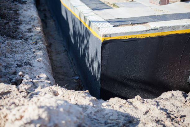 Professional Waterproofing technician working in Clarence, NY